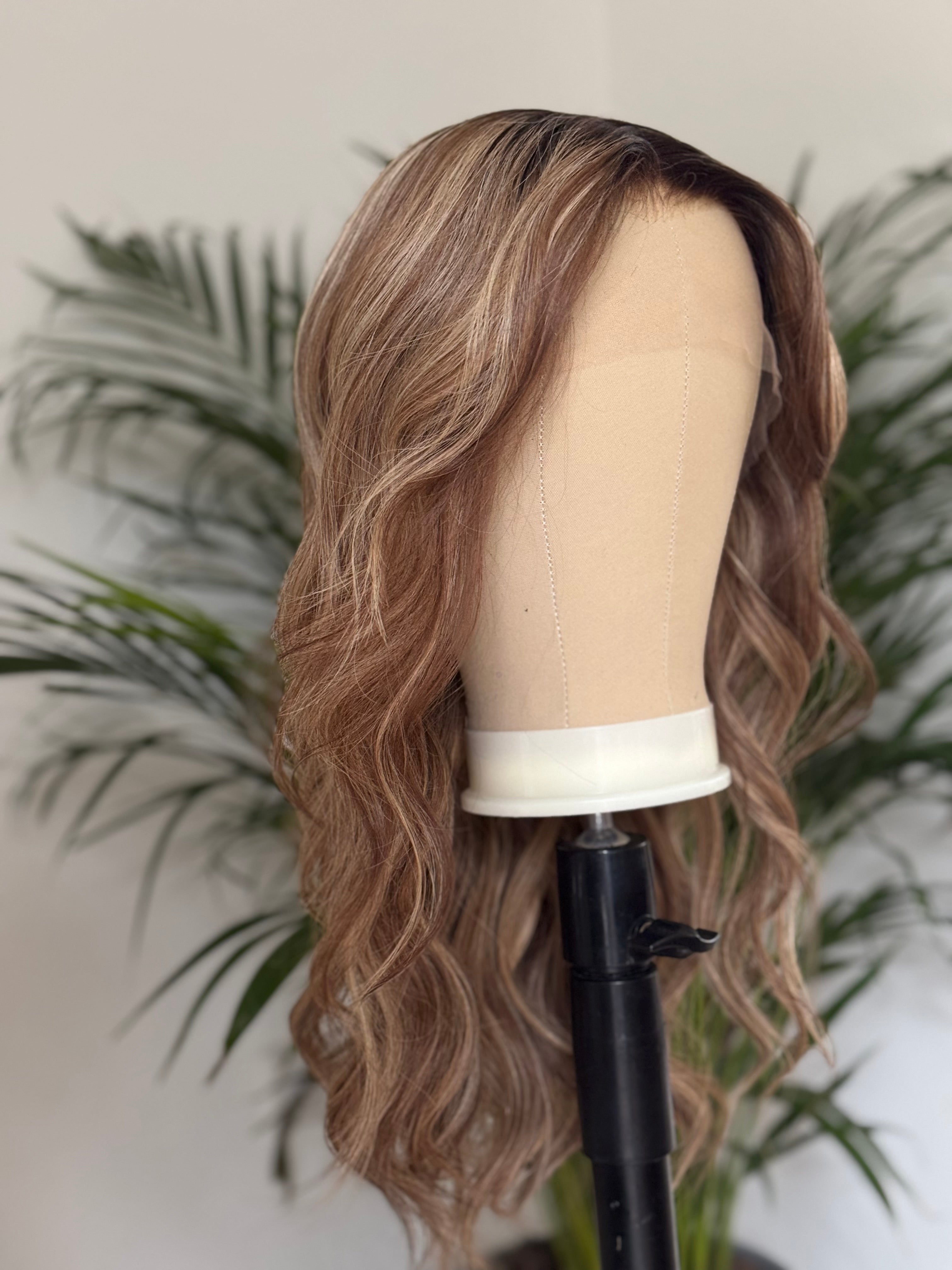 Back view of 22 inch wavy balayage human hair wig with 180 percent density