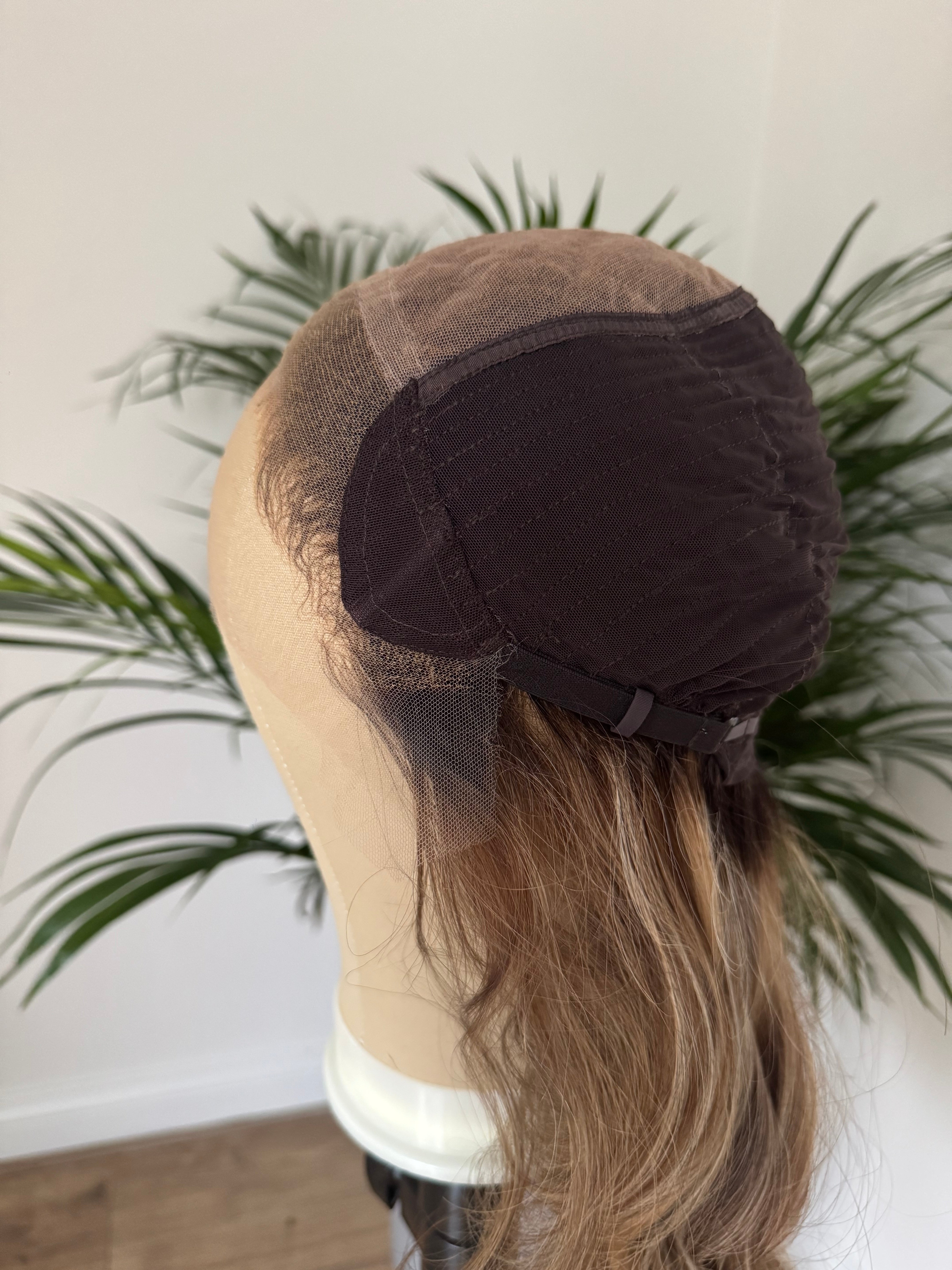 Inside view of lace cap construction on premium human hair wig