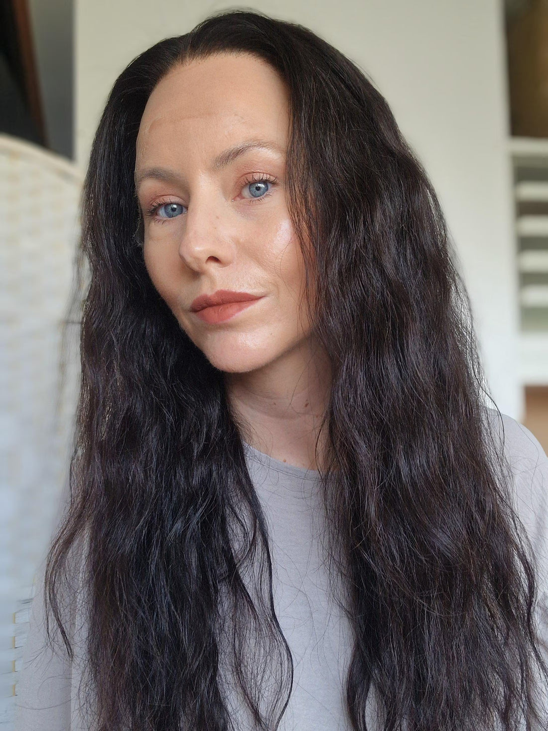 The Diana Wig featuring soft natural black curls and HD lace
