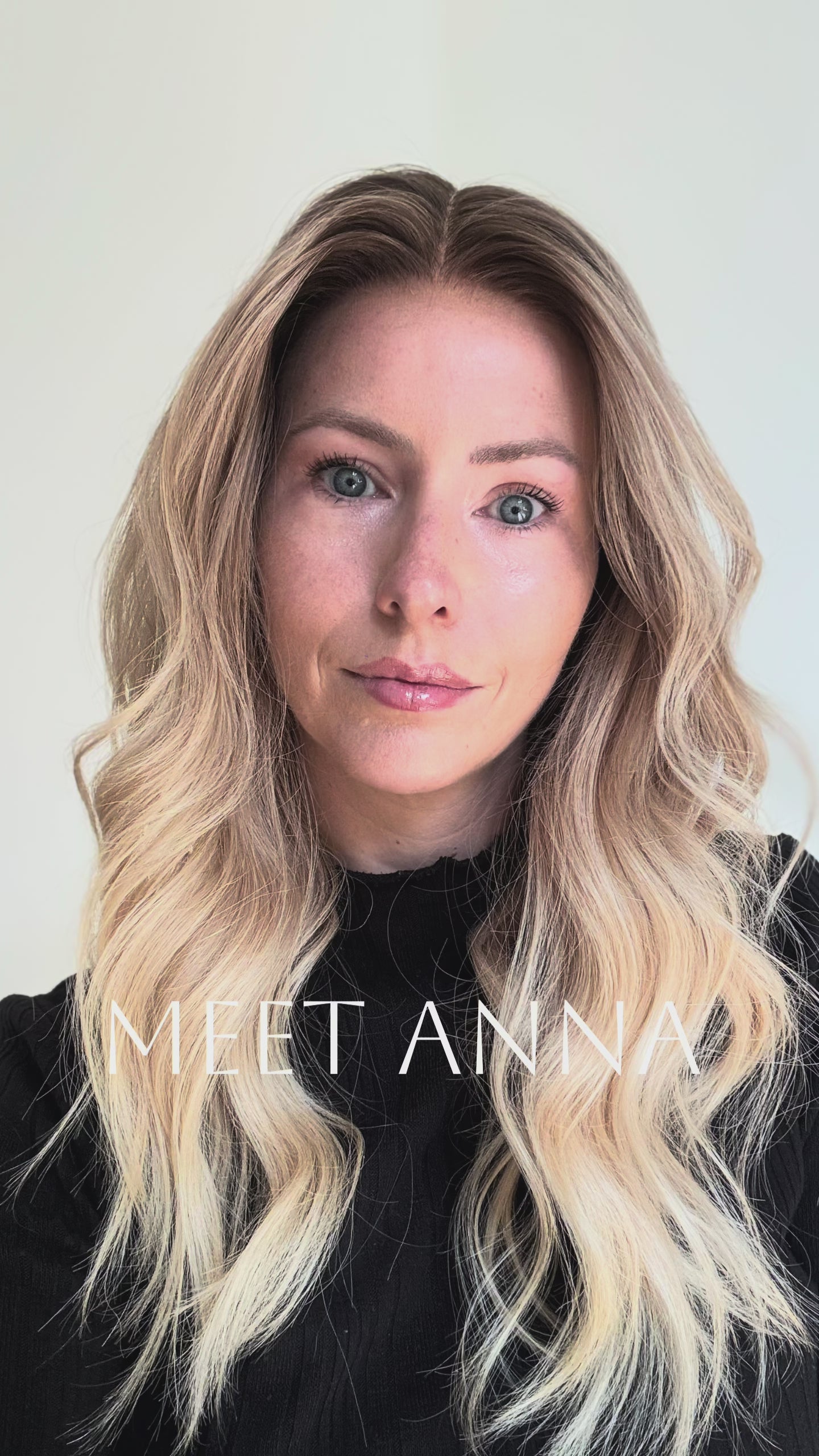 Blonde human hair wig with natural roots and soft waves in motion
